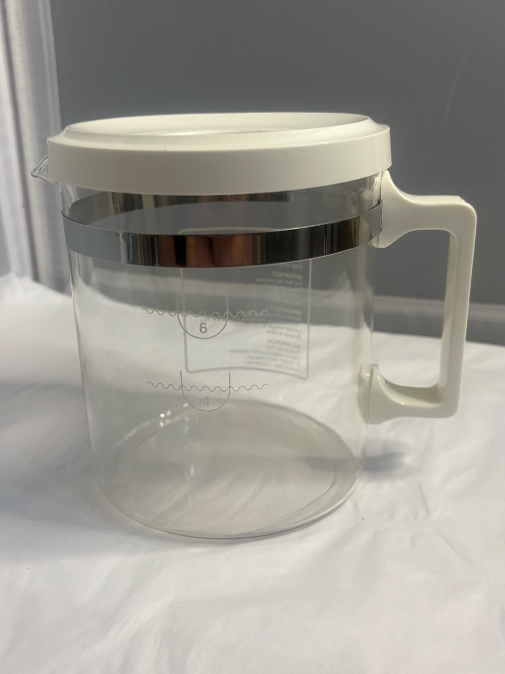 Clear glass tea pot with White Lid and Handle